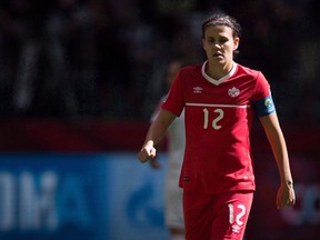 Canada's Christine Sinclair looks on during first half of the FIFA Women's World Cup round of 16 soccer action in Vancouver in a June 21, 2015, photo.