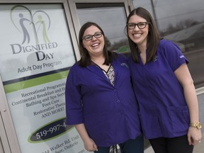 Sisters Stephanie Moore, left, and Erin White, co-owners of Dignified Day, an adult day program, are pictured during an open house on March 25, 2017.