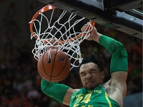 Oregon's Dillon Brooks (24) dunks during the first half of the team's NCAA college basketball game against Oregon State on March 4, 2017, in Corvallis, Ore.