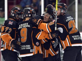 The Essex 73's celebrate their Game 4 victory over the Lakeshore Canadiens in the Stobbs final at the Essex Sports Complex in Essex, Ont., on March 14, 2017.