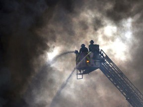 Windsor fire crews douse a blaze at J&B Auto Parts on Provincial Road on March 9, 2017.