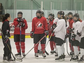 Head coach, Laura Schuler, left, leads Canada's national team a during practice at the Leamington Kinsmen Recreation Complex on March 25, 2017.
