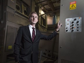 Chase Stoyshin, a member of the Stoyshin-owned, family-run Essex Linen Supply, is pictured at the Ford City laundromat on March 2, 2017. The company, which started in 1965, is struggling with soaring hydro costs.