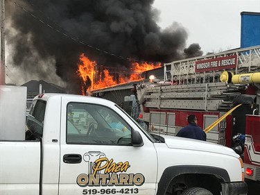Windsor fire crews battle a blaze at J&B Auto Parts on Provincial Road on March 9, 2017.