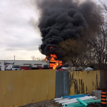 Windsor fire crews battle a blaze at J&B Auto Parts on Provincial Road on March 9, 2017.