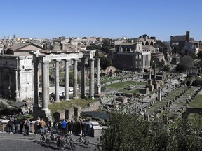 A general view shows tourists visiting the Roman Forum on March 11, 2017 in Rome.