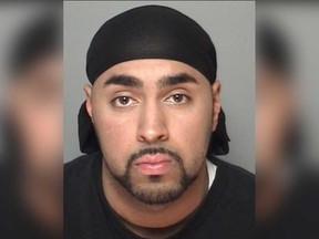 Gurfathe Singh Kooner, 31, remains wanted by Windsor Police Service and Essex OPP on multiple charges. He was convicted in 2013 of firearm offences.