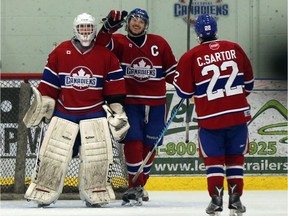 Lakeshore Canadiens goaltender Colin Tetreault is congratulated by teammates after Lakeshore defeated  the Blenheim Blades at the Atlas Tube Centre in Lakeshore, Ont., on Feb. 28, 2017.