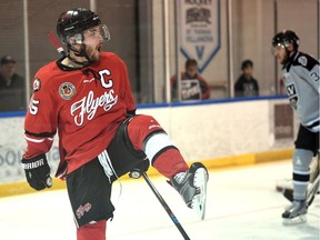 Leamington Flyers captain Zach Guilbeault (15) celebrates a goal against the LaSalle Vipers on March 22, 2017 at the Vollmer Complex.