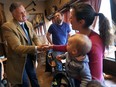 Federal Conservative leadership candidate Maxime Bernier visited Windsor on March 6, 2017 at a breakfast function. Bernier meets Steve and Tina Chittle along with their daughter Rebecca during the event held at the Lumberjack Restaurant.