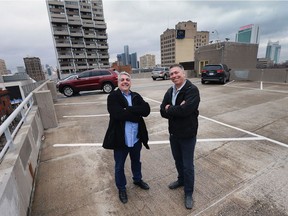 Mark Boscariol, left, and Mark Schincariol are shown on the top level of the Pelissier Street Parking Garage on March 1, 2017. The two businessmen and a third investor want to submit a proposal to buy the structure and put in $750,000 in improvements, including a rooftop event space.