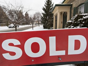 A for sale sign is on display in Brantford, Ont., in this Jan. 10, 2017 file photo.
