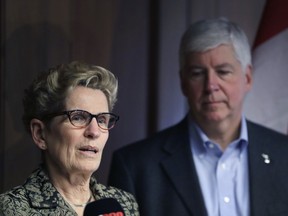Ontario Premier Kathleen Wynne and Michigan Gov. Rick Snyder address the media on March 13, 2017 in Detroit. Snyder and Wynne stressed that they want their voices heard as President Donald Trump demands a negotiation of trade policies between the United States, Mexico and Canada.