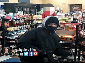 A security camera image of the slightly-built person who has repeatedly robbed the Mac's Convenience Store at 390 Mill St. in west Windsor.