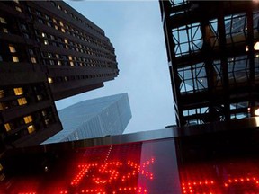 A tote board TSX numbers in Toronto, on Dec. 31, 2012.