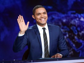 In this Sept. 29, 2015 file photo, Trevor Noah gestures on the set during a taping of "The Daily Show with Trevor Noah" in New York.