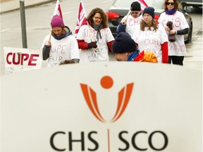 Unionized staff of the local Canadian Hearing Society (CHS) on day 15 of their picket on Friday March 24, 2017 in Peterborough, Ont.