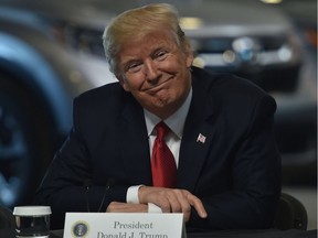 U.S. President Donald Trump speaks with auto executives at American Center for Mobility in Ypsilanti, Mich., on March 15, 2017.