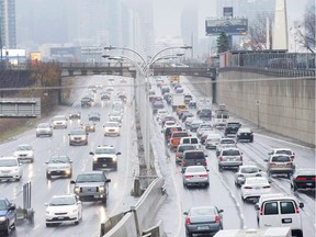 Vehicles makes there way into and out of downtown Toronto along the Gardiner Expressway in Toronto on Nov. 24, 2016.