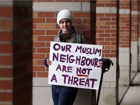 University of Windsor student Sophie Rutter holds a sign on March 1, 2017. Rutter is co-organizing a demonstration at Windsor City Hall on March 4, meant to counter a separate demonstration that she alleges promotes Islamophobia.