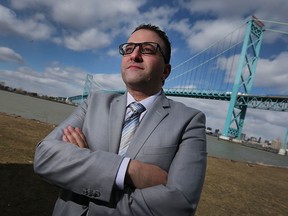 Windsor immigration lawyer Eddie Kadri, standing on the Canadian side of the Detroit River on Friday, expects a wave human trafficking and asylum seekers trying to cross the border in response to U.S. President Donald Trump's latest travel ban.