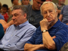 Stephen Chaborek, right, of Indian Road and other property owners were joined by Canadian Transit Company president Dan Stamper, left, during a meeting with lawyers Harvey Strosberg, Sharon Strosberg and Bill Sasso and west Windsor property owners at Mackenzie Hall on Aug. 27, 2013.