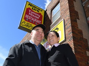 Harvey and Susan Lo stand in front of their restaurant, Harvey Lo's Yummy House at 1144 Wyandotte St. East. The longtime Windsor Chinese eatery will close March 19, 2017, after 38 years of business.
