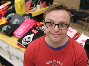 Andrew Banar, 25, started Group Hug Apparel, his own clothing line, to help pay for college and support charities. He's shown in this March 2015 photo.