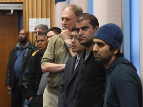 Windsor taxi drivers listen as Chris Schafer,  public policy manager for UBER Canad, speaks at Windsor city council on March 27, 2017.