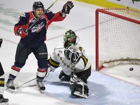 Cristiano DiGiacinto celebrates a goal for the Windsor Spitfires against London Knights goaltender Tyler Parsons during last season's playoffs. DiGiacinto is now trying ot make the most of a free-agent invite by the NHL's Winnipeg Jets.