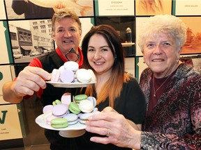 Best of Windsor Essex campaign winners Doug Quick, left, of Kingsville Golf Course, Saskia Scott of Sweet Revenge and Brenda Anger of Harrow Fair celebrate by enjoying treats from Sweet Revenge Bake Shop at Windsor's Chimczuk Museum March 29, 2017. Tourism Windsor Essex Pelee Island announced 43 awards from 785 nominations of locations where people like to eat, shop, dine and play.