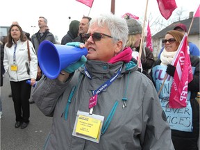 CUPE members from across Ontario, including Patricia Gray joined pickets for a rally at the Canadian Hearing Society officeon Friday, March 31, 2017.