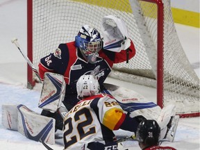 Anthony Cirelli of the Erie Otters scores on Windsor Spitfires goaltender Mike DiPietro during second-period action of an Ontario Hockey League game at the WFCU Centre in Windsor on March 9, 2017.