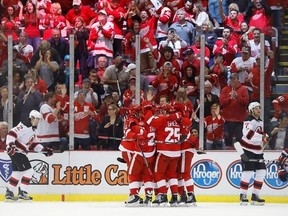 Detroit Red Wings left wing Tomas Tatar celebrates his goal against the New Jersey Devils during the first period of the final NHL hockey game at Joe Louis Arena, Sunday, April 9, 2017, in Detroit. (AP Photo/Paul Sancya)