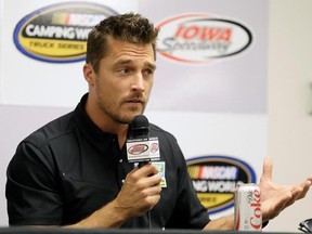 FILE - In this June 19, 2015, file photo, Iowa farmer Chris Soules, a former star of ABC&#039;s &ampquot;The Bachelor,&ampquot; speaks during a news conference before a NASCAR event in Newton, Iowa. Soules was booked early Tuesday, April 25, 2017, after his arrest on a charge of leaving the scene of a fatal accident near Arlington, Iowa. Police said he fled the scene of a fatal traffic accident. (AP Photo/Charlie Neibergall, File)