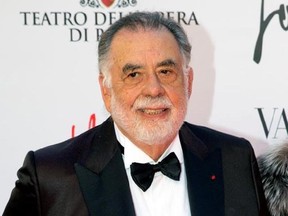 FILE - In this May 22, 2016 file photo, director Francis Ford Coppola poses for photographers as he arrives for the premiere of Verdi&#039;s &ampquot;La Traviata&#039;&#039; at the Rome Opera House, in Rome. Coppola and the cast of &ampquot;The Godfather&ampquot; reunited for one evening and a double feature at Radio City Music Hall to celebrate the film&#039;s 45th anniversary. The Tribeca Film Festival closed out its 16th edition Saturday, April 29, 2017, with a grand double feature of &ampquot;The Godfather,&ampquot; parts one and two. (AP Photo/Andre