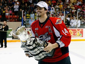 In this May 1, 2010 photo, Adam Henrique of the Windsor Spitfires skates with the Memorial Cup after the team defeated the Brandon Wheat Kings in the final of the 2010 Mastercard Memorial Cup Tournament in Brandon, Man.
