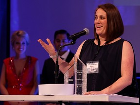 Windsor, ON. April 22, 2015 -- Amy Szewczuk, right, of Amy's Helping Hands accepts Mid-sized company of the Year award during 2015 Business Excellence Awards Gala in Augustus Ballroom at Caesars Windsor Wednesday April 22, 2015.
