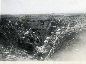 Canadian soldiers are shown in a captured German machine-gun emplacement during the Battle of Vimy Ridge in April 1917.