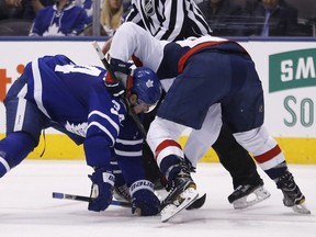 Capitals Jay Beagle and the Leafs Auston Matthews battle during a faceoff in Game 4 of Toronto's first-round playoff series against Washington at the Air Canada Centre in Toronto on April 19, 2017.