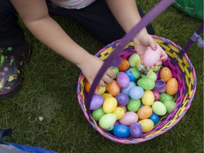 Children count their eggs after the 4th annual Community Easter Egg Hunt hosted by the City Church, Saturday, April 15, 2017.