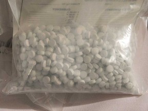 A police evidence bag full of fentanyl pills in Vaughan is shown in this February 2017 file photo.