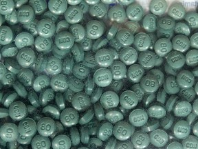 Fentanyl in pill form is shown in this 2015 file photo from a drug seizure in Calgary.