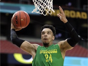 In this March 31, 2017, photo, Oregon's Dillon Brooks dunks during a practice session for the NCAA Final Four tournament college basketball semifinal game in Glendale, Ariz. Brooks has announced that he will declare for the NBA draft.