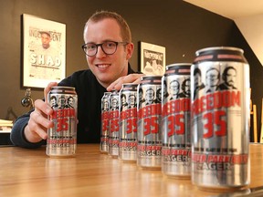 Dean Scott of Windsor's Shoutabout Creative Agency with cans of Freedom 35 Lager - official beer of the Trailer Park Boys. The Windsor ad agency was behind the brand design for the beer.