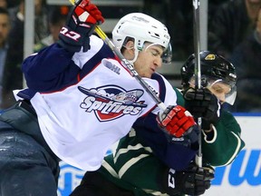Gabriel Vilardi of the Spitfires knocks Olli Juolevi to the ice early in their Game 7 in Budweiser Garden on Tuesday April 4, 2017.