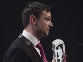 Jason Dufour accepts the award for recording engineer of the year at the Juno Gala awards show in Ottawa on April 1, 2017.