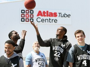 The Windsor Express are set to take their home playoff games to the Atlas Tube Centre in Lakeshore. In photo, Lakeshore Mayor Tom Bain tosses up the first tipoff for Express players Warren Ward and Jenard Jarreau, centre, as their teammate Maurice Jones, left, and Noel Moffatt, right, enjoy the fun during a news conference on April 12, 2017.