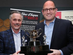 Mayor Drew Dilkens, at right, is seen with Windsor Spitfires' president John Savage. 
The city and team joined forces for the 2017 Memorial Cup, but it's uncertain if the city will support the team serving as a hub centre.