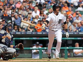 Andrew Romine of the Detroit Tigers hits a fourth inning grand slam during the game against the Minnesota Twins on April 12, 2017 at Comerica Park in Detroit, Michigan.